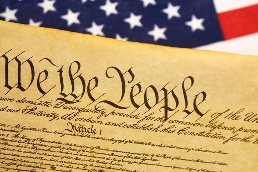 For Constitution Day, an image of the U.S. Constitution and the American flag.