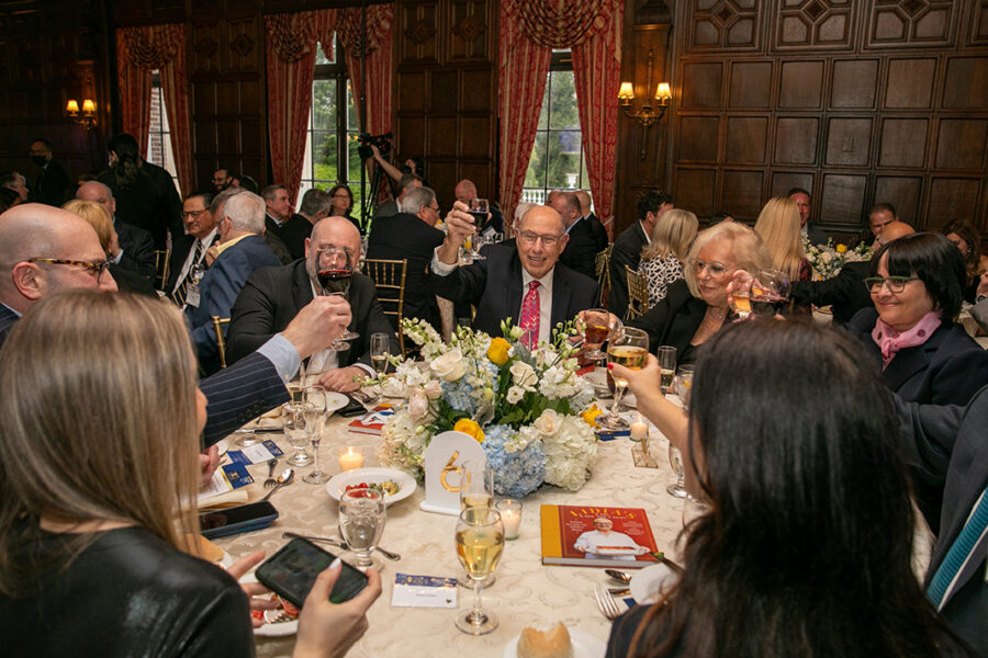 A gathering of alumni at a dinner