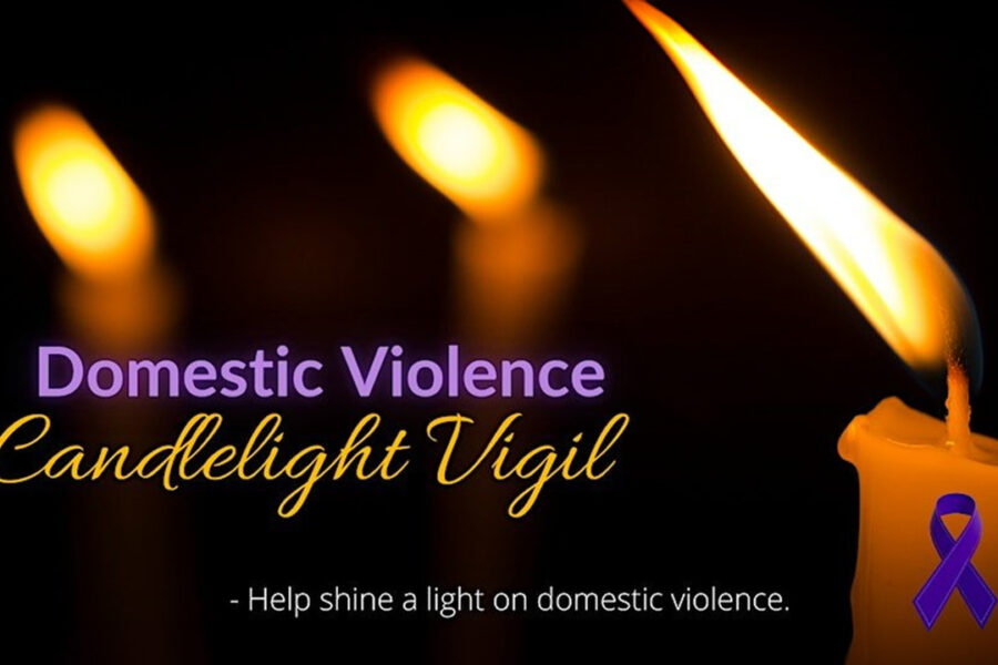 Domestic violence candlelight vigil, images of candles in the night.