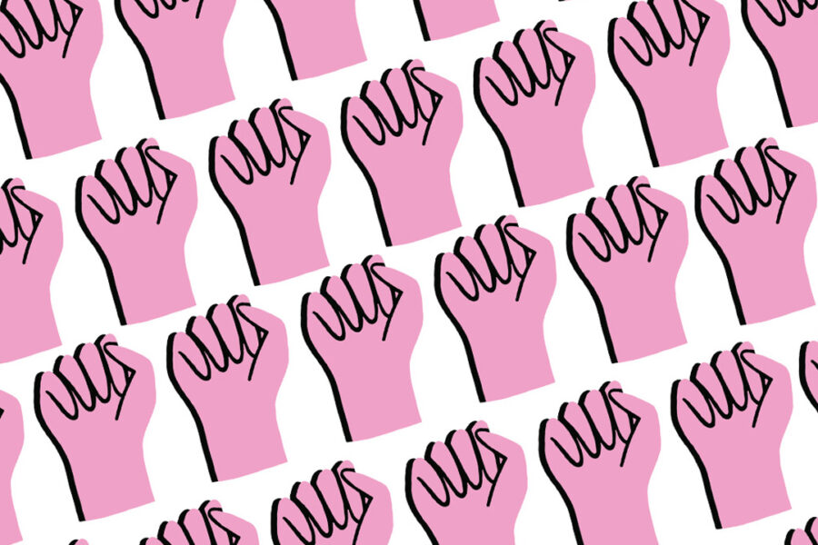 Pink fists raised up for women's rights