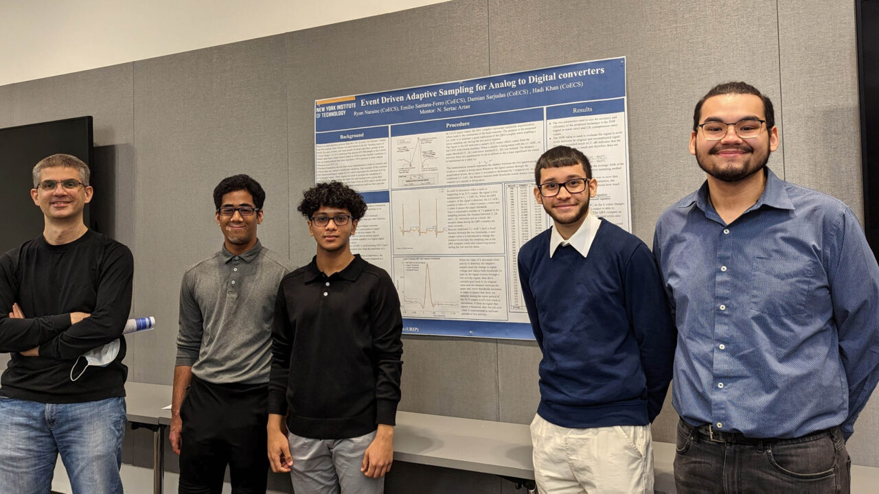 Five students standing in front of their project board.