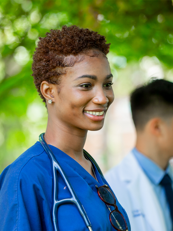 A medical student is listening to students outside.