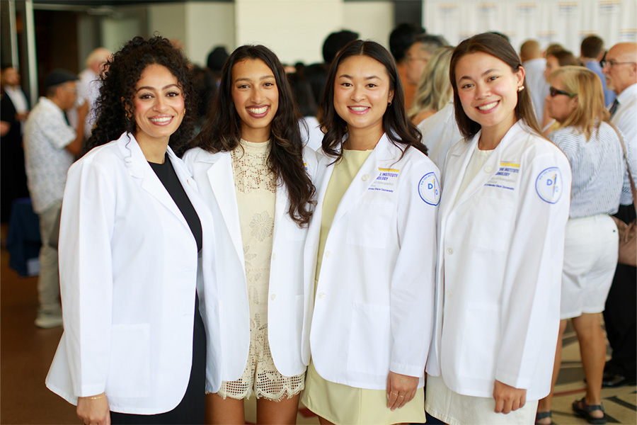 Students at NYITCOM-Arkansas' White Coat Ceremony in August 2024.