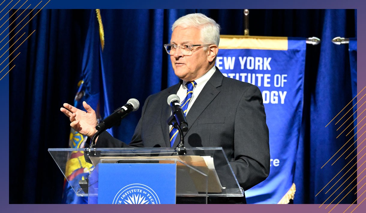 NYIT president speaking at a podium.