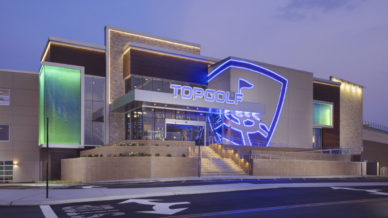 Topgolf building with neon signs